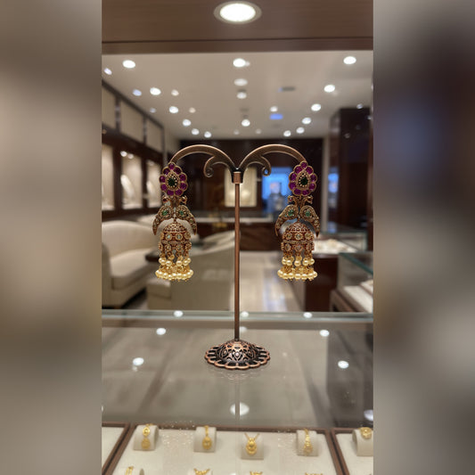 Traditional Gold Jhumka Earrings with Floral and Pearl Detailing