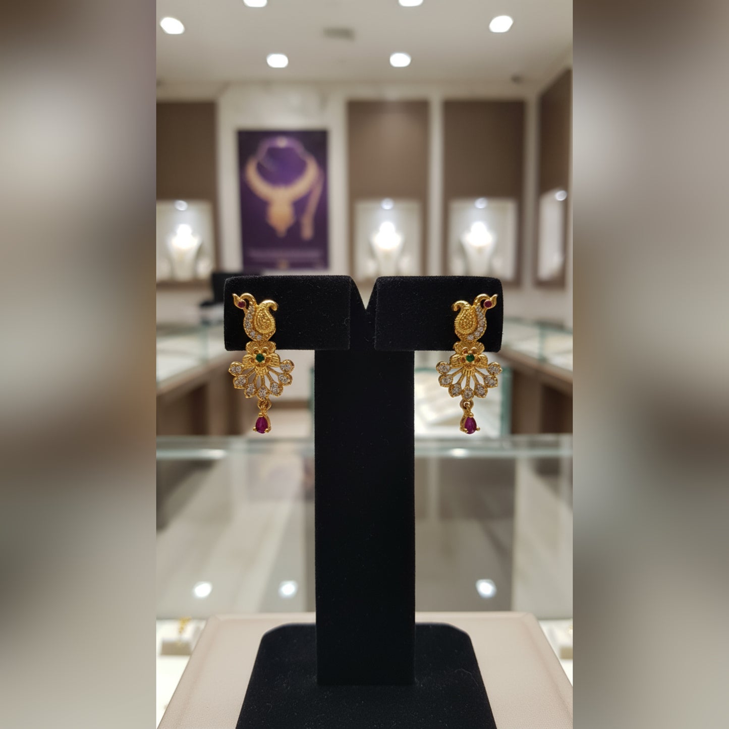 Delicate Gold Peacock Motif Earrings with Gemstone Accents