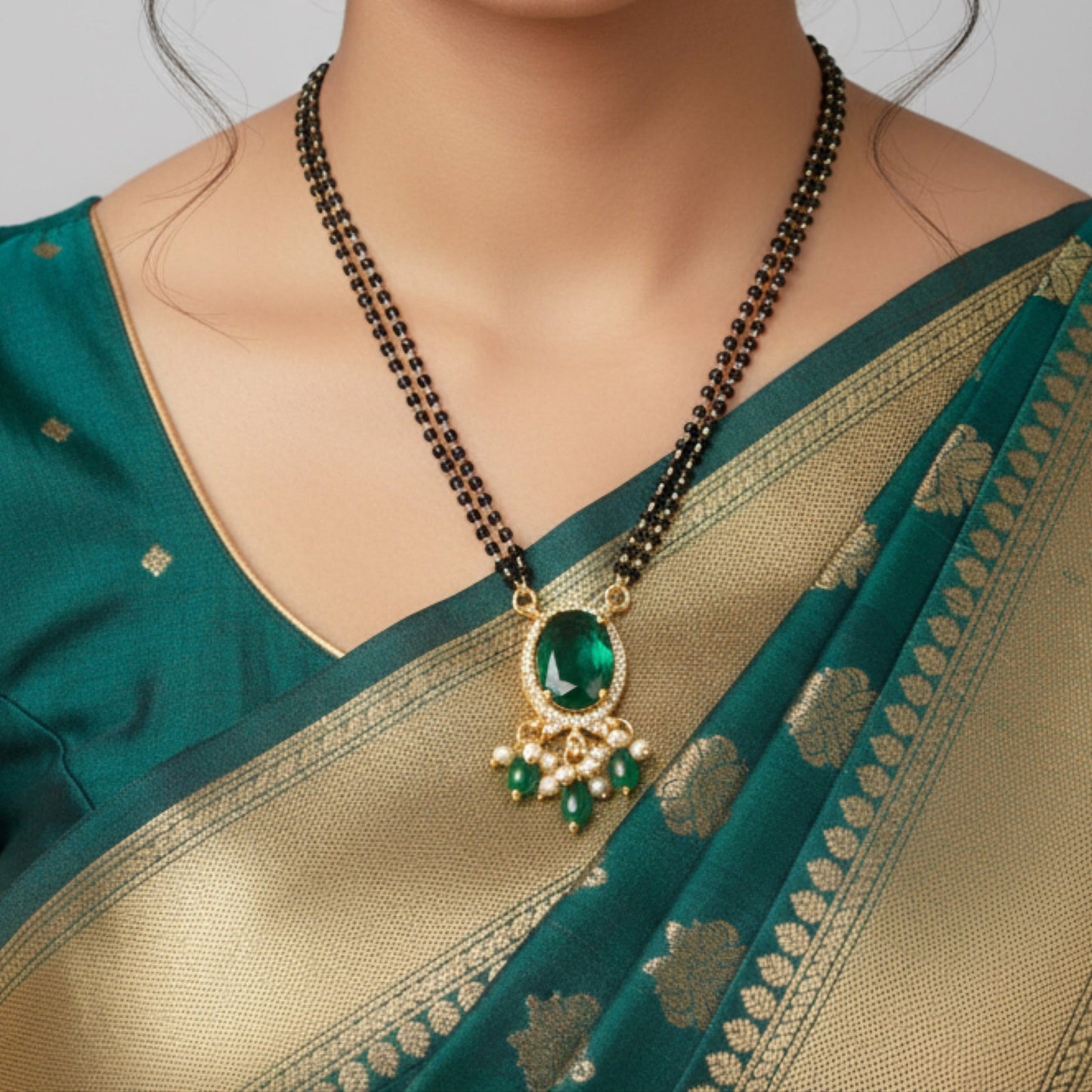Elegant Double-Strand Black Bead Mangalsutra with Green Pendant