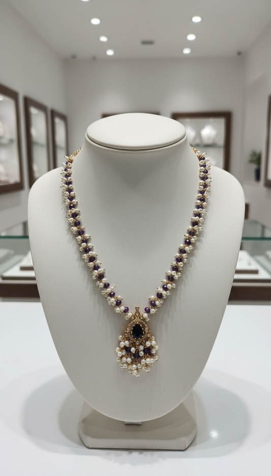 Elegant Gold and Pearl Necklace with Amethyst Accents